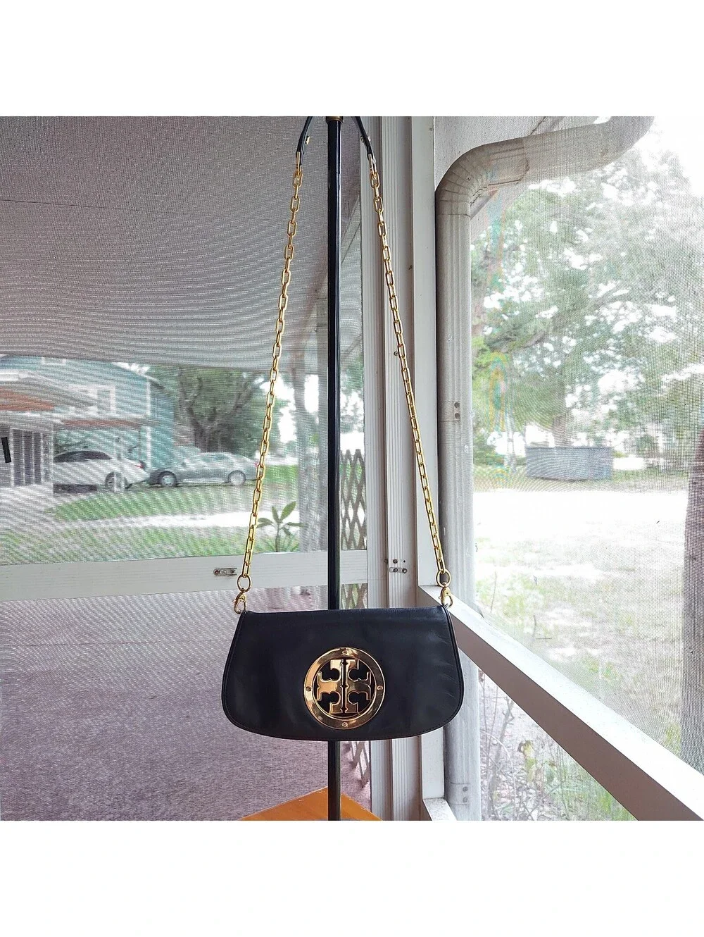 Tory Burch Reva black leather clutch bag